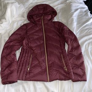 Michael Kors packable down filled jacket. Size x small. Color maroon